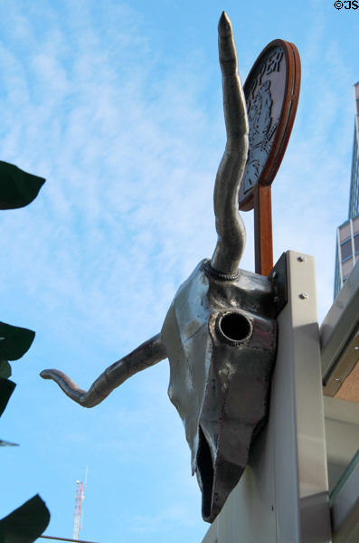 Tucson Link streetcar shelter sculpted art in form of cow skull. Tucson, AZ.
