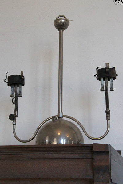 Hanging gas lamp with pressure tank at Tombstone Courthouse Museum. Tombstone, AZ.