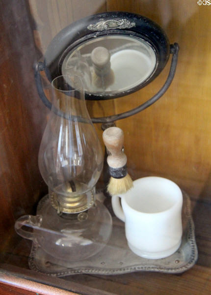 Shaving mirror with oil lamp at Tombstone Courthouse Museum. Tombstone, AZ.