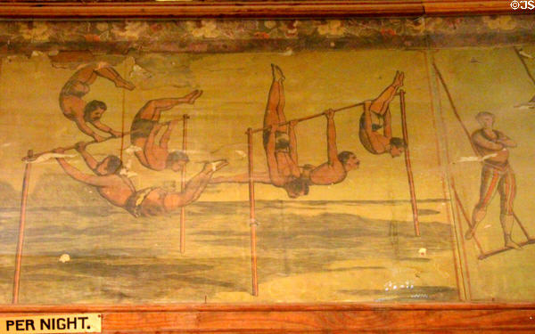 Lithographed circus poster (1883) with acrobats on crossbars at Bird Cage Theatre. Tombstone, AZ.