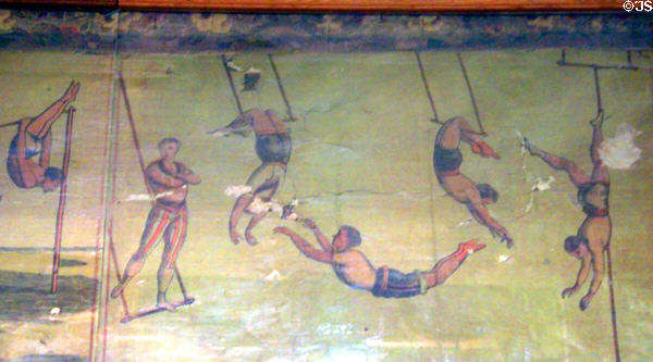 Lithographed circus poster (1883) with trapeze artists at Bird Cage Theatre. Tombstone, AZ.