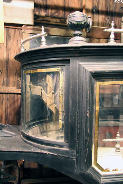 Curved front window of Black Moriah hearse at Bird Cage Theatre. Tombstone, AZ.
