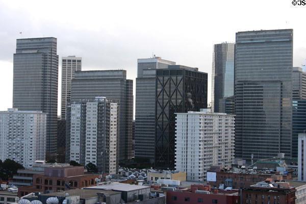 Four thin buildings of Embarcadero Center (1971-82) plus X-braced Maritime Plaza. San Francisco, CA. Architect: John Portman & Assoc..
