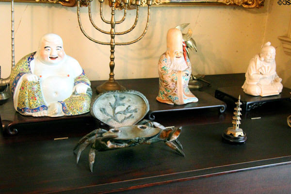 Buddha figurines on piano at Pardee Home Museum. Oakland, CA.