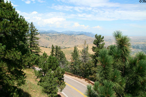 Road to top of Lookout Mountain with mountains in distance. CO.