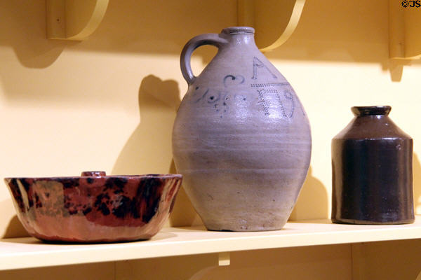 Redware cake or jelly mold (early 1800s), salt-glazed jug (1791) by Abraham Mead, stoneware preserve jar with brown slip glaze (late 1800s) at Connecticut Historical Society. Hartford, CT.