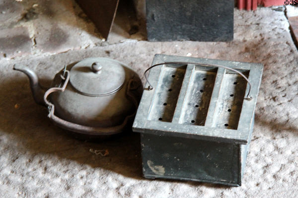 Kettle & foot warmer on hearth in parlor at Strong House. Windsor, CT.