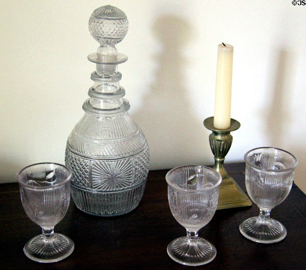 Molded glass carafe & glasses with candlestick at Dr. Hezekiah Chaffee House. Windsor, CT.