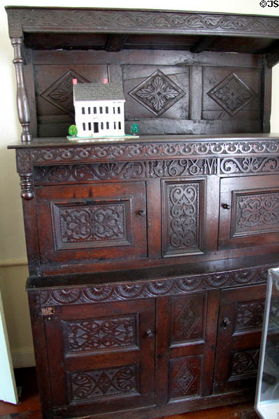 Chest with carved panels & initials RM (1698) at Oliver Ellsworth Homestead Museum was exhibited at Louisiana Exposition. Windsor, CT.