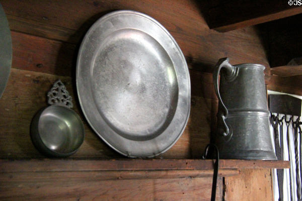 Pewter wares over fireplace at Joshua Hempstead House. New London, CT.
