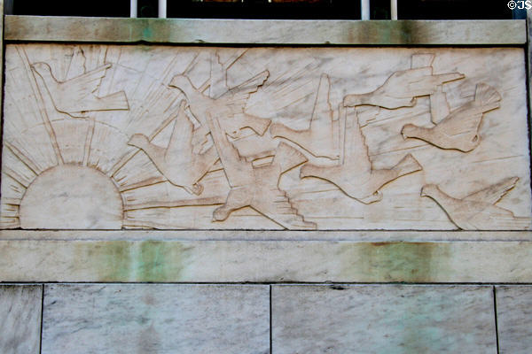 Art Deco frieze of carrier pigeons over sun on Waterbury Post Office. Waterbury, CT.