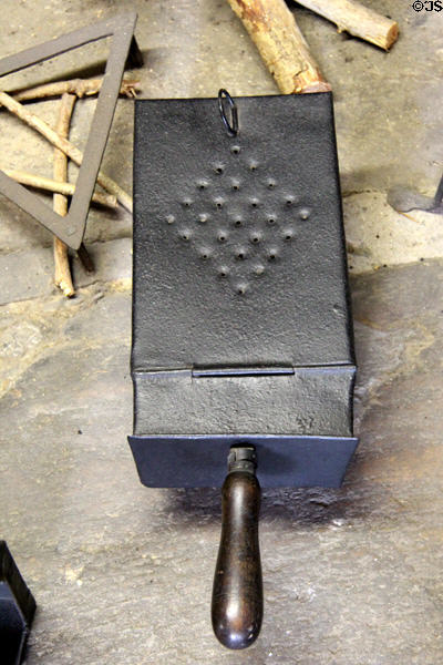 Fire safe used to transport coals between fireplaces at Judson House. Stratford, CT.