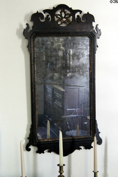 Looking glass with cutout design at Judson House. Stratford, CT.