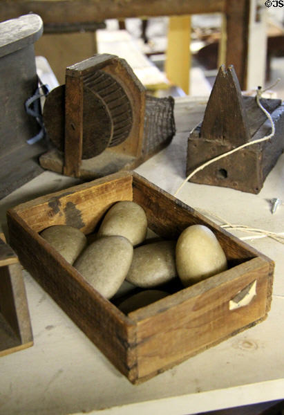 Rocks in box used to encourage chickens to lay eggs there at Judson House. Stratford, CT.
