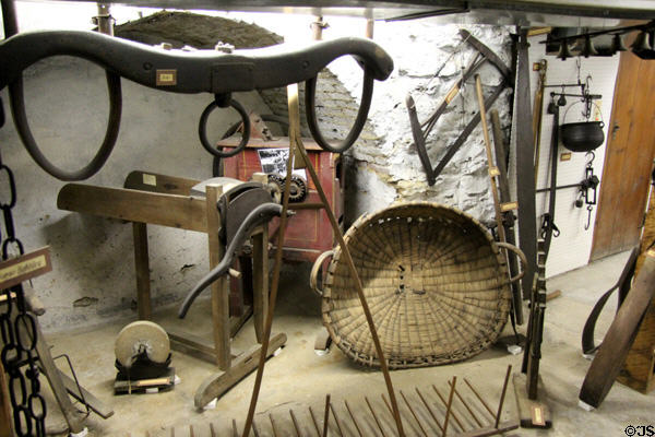 Collection of antique farm implements at Judson House. Stratford, CT.