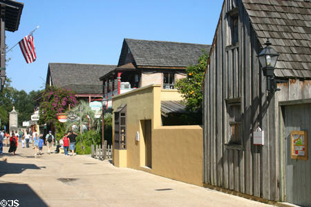Along St. George Street with closest reconstructed Lorenzo Gomez (prior to 1763) & other houses of Colonial Spanish Quarter Museum & old city gate at end. St Augustine, FL.