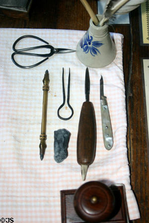 Tools for pen & ink making & writing in house of scribe at Colonial Spanish Quarter Museum. St Augustine, FL.