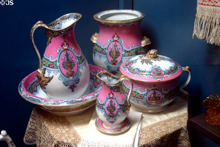 Pink & green wash basin & chamber pot set at Lightner Museum. St Augustine, FL.