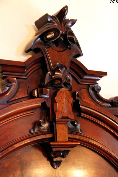 Headboard detail of 1876 Philadelphia World's Fair bed at Dodge House. Council Bluffs, IA.