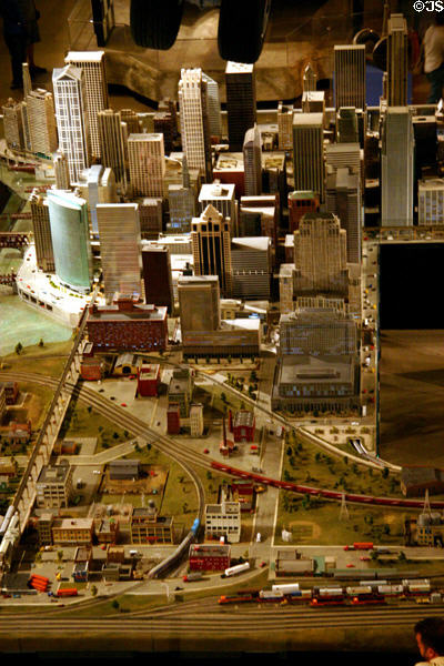 Model railroad circulates through model Chicago at Museum of Science & Industry. Chicago, IL.