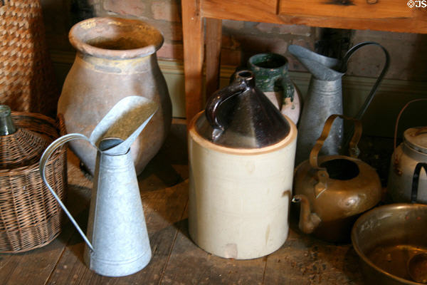 Stoneware & glass food storage jugs at Laura Plantation. Vacherie, LA.