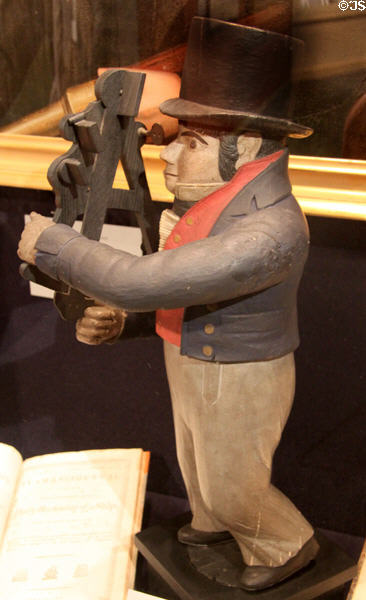 Little Navigator shop sign carving (c1810) attrib. to Samuel King at New Bedford Whaling Museum. New Bedford, MA.