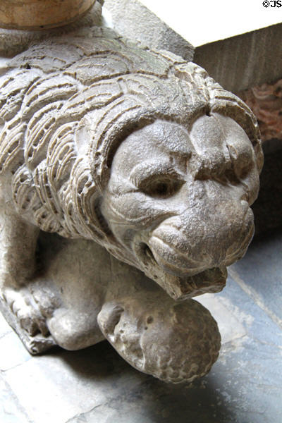 Lion holding human sculpture supports column at Gardner Museum. Boston, MA.