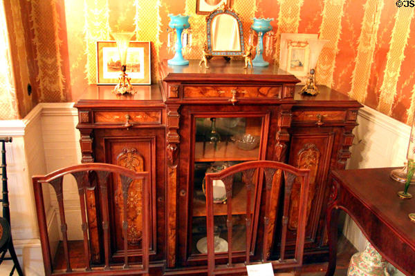 Display cabinet in music room at Gibson House Museum. Boston, MA.