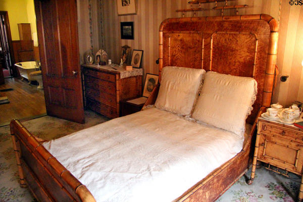 Third-floor bedroom with simulated bamboo furniture at Gibson House Museum. Boston, MA.