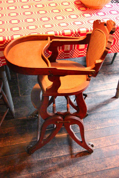 Baby's wheeled high chair which converts to rocker at Gibson House Museum. Boston, MA.