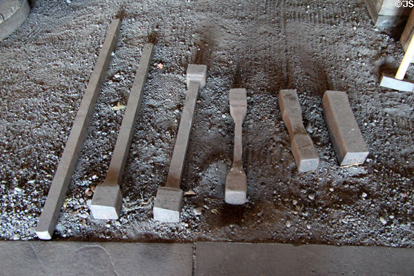 Stages through which iron pigs are forged into rods at Saugus Iron Works. Boston, MA.