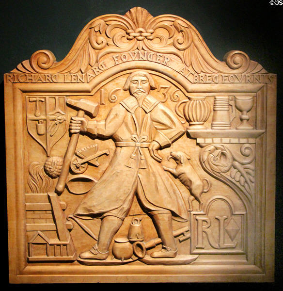 Replica wooden carved foundry mold for iron fireback (1636) used to protect bricks in fireplace hearth at Saugus Iron Works. Boston, MA.