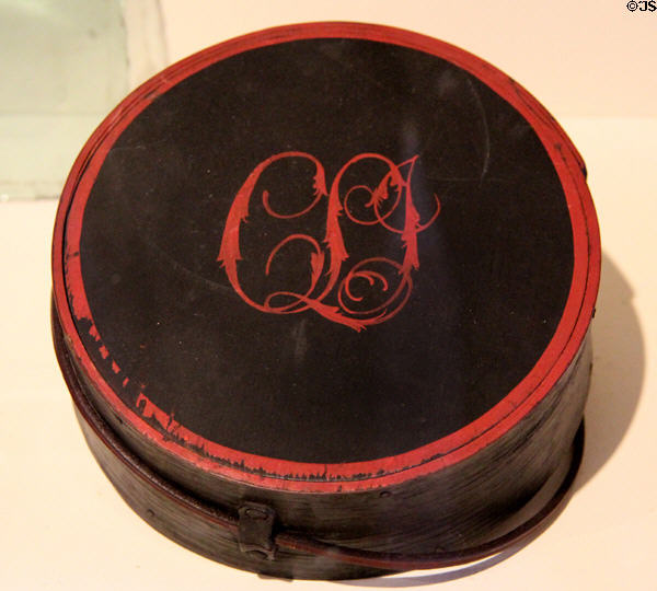 Leather-covered wood canteen (early 19thC) painted with initials at Concord Museum. Concord, MA.