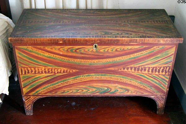 Trunk painted with rainbow of colors at Rev. John Hale House. Beverly, MA.