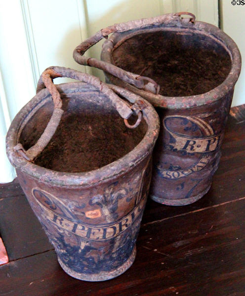 Leather fire buckets at Jeremiah Lee Mansion. Marblehead, MA.
