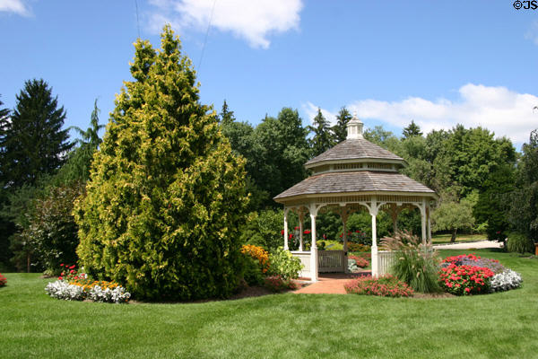 Gazebo among evergreens at Hidden Lake Gardens. MI.