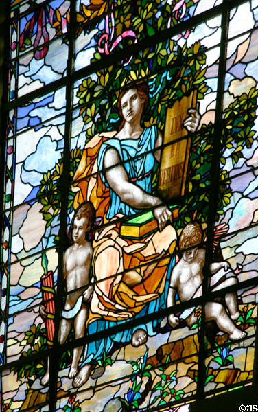 Law panel with woman holding books plus light & truth tablet on Missouri values stained glass window at Missouri State Capitol. Jefferson City, MO.