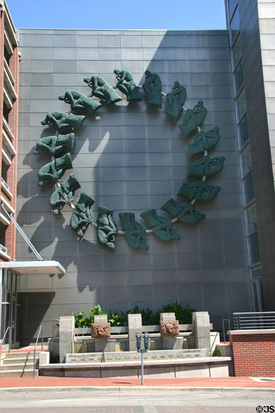 Sculpted circle of thinkers on parking structure opposite Savoy Hotel on 9th St. Kansas City, MO.