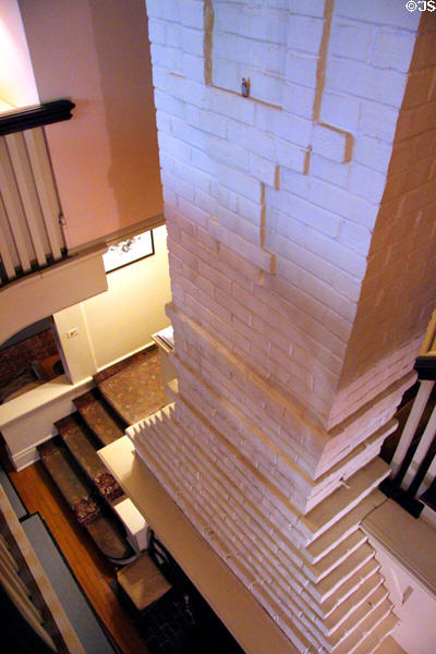 Fireplace in stairway spiral at Thomas Hart Benton Home. Kansas City, MO.