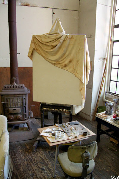 Easel beside stove at Thomas Hart Benton's Studio State Historic Site. Kansas City, MO.