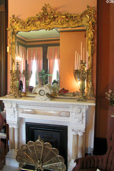 Fireplace with Rococo style mirror at Vaile Mansion. Independence, MO.