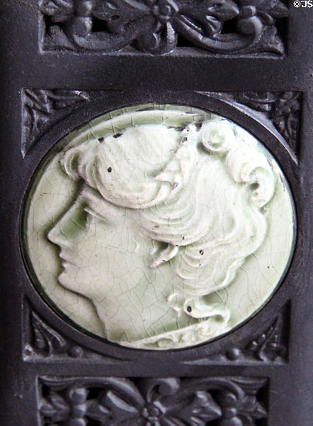 Encaustic tiles on cast iron stove (1890) by Bridgeford & Co. at Vaile Mansion. Independence, MO.