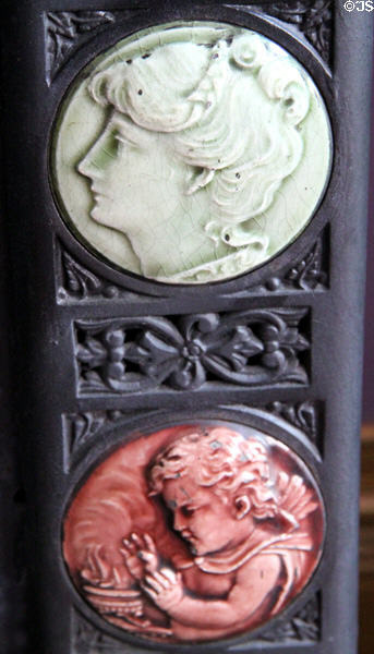 Encaustic tiles on cast iron stove (1890) by Bridgeford & Co. at Vaile Mansion. Independence, MO.