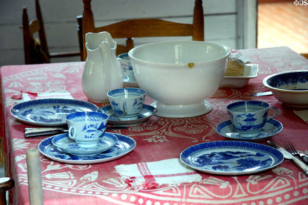 Table with China in Mark Twain birthplace cabin at Mark Twain Memorial Shrine. MO.