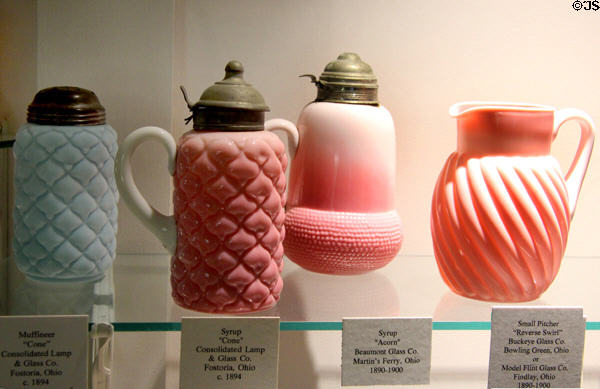 Glass utility vessels (1890s) made in OH by firms Consolidated Lamp & Glass; Beaumont Glass; Buckeye Glass; Model Flint Glass at Museum of American Glass. Milville, NJ.