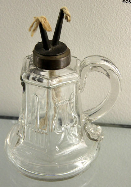 Pressed glass harp or lyre pattern whale oil lamp (1840-70) by unknown at Museum of American Glass. Milville, NJ.
