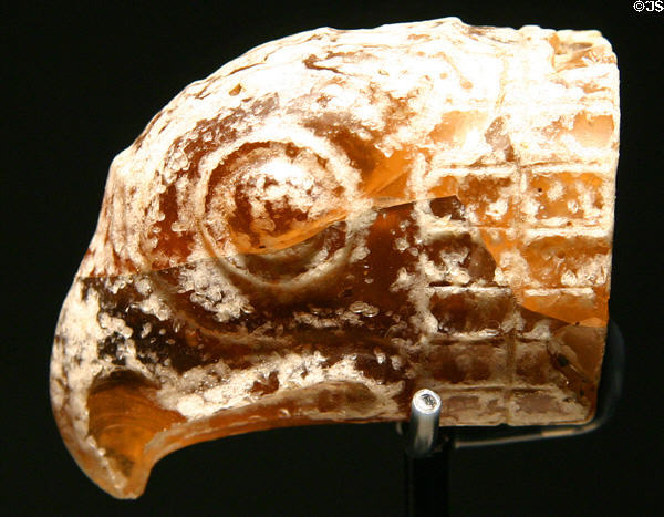 Egyptian glass head of eagle (c3rdC BCE) may be handle of dagger at Corning Museum of Glass. Corning, NY.