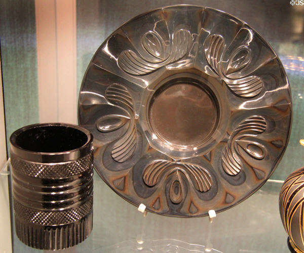 Black Hyalith glass beaker (c1818-25) & Agatine glass plate (c1830-40) both probably by glassworks of count of Buquoy of Southern Bohemia at Corning Museum of Glass. Corning, NY.