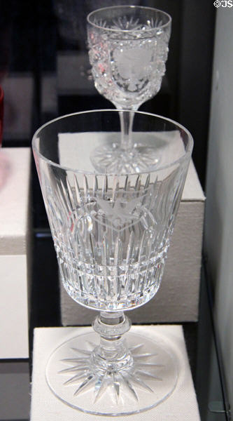 White House service cordial glass for President Benjamin Harrison (1891) by C. Dorflinger & Sons plus Water Goblet for President Franklin Roosevelt (1938) by T.G. Hawkes & Co. at Corning Museum of Glass. Corning, NY.