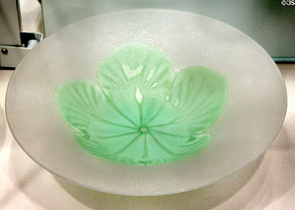 Cluthra bowl where colored glass & air bubbles are trapped between two layers of colorless glass by Steuben Glass at Corning Museum of Glass. Corning, NY.